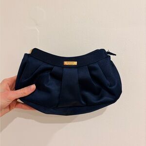 Clé de Peau Navy Clutch with Gold Detail